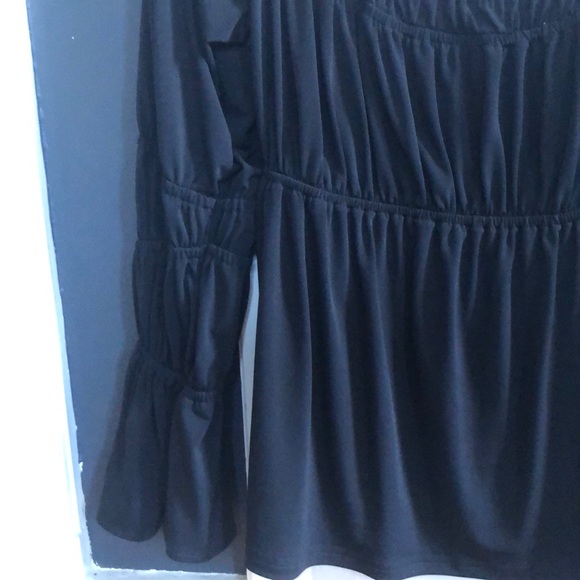 Black flirty top. - Picture 3 of 4